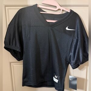 Nike boys black jersey.